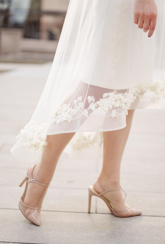 Sheer floral appliqué midi bridal skirt with nude heels